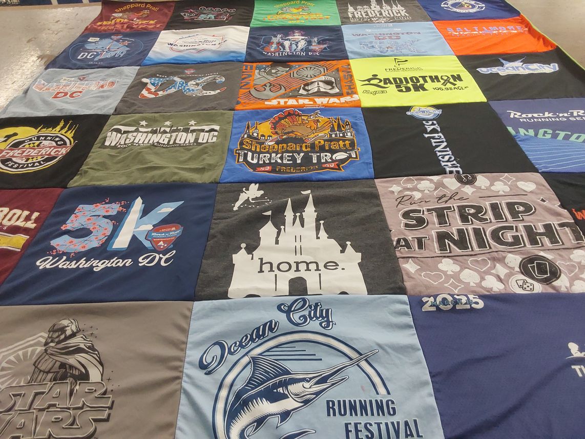 T-shirt quilt with running, events themes by Lizbeth from MD