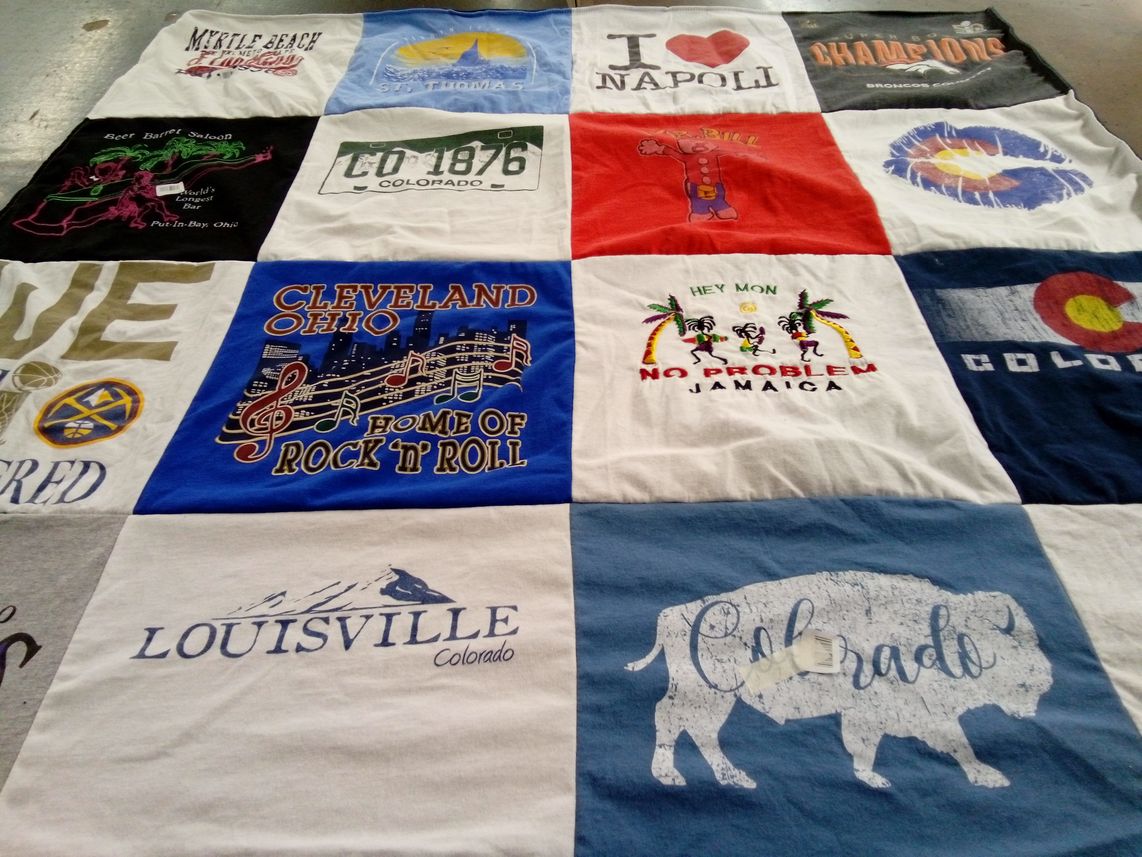 T-shirt quilt with travel, music themes by Kimberly from CO