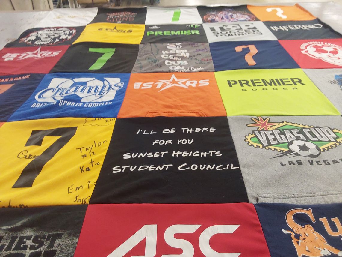 T-shirt quilt with soccer, sports themes by Lori from AZ