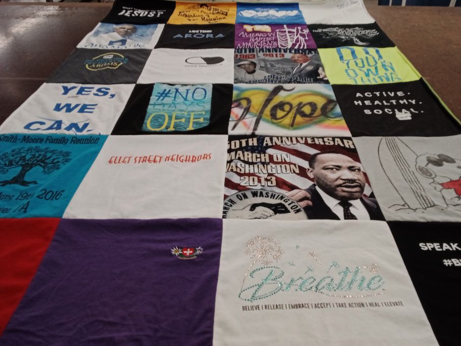 T-shirt quilt with community, activism themes by Suzanne from PA