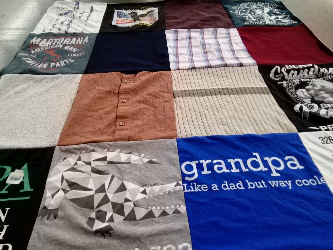 T-shirt quilt with family themes by Paige from MI