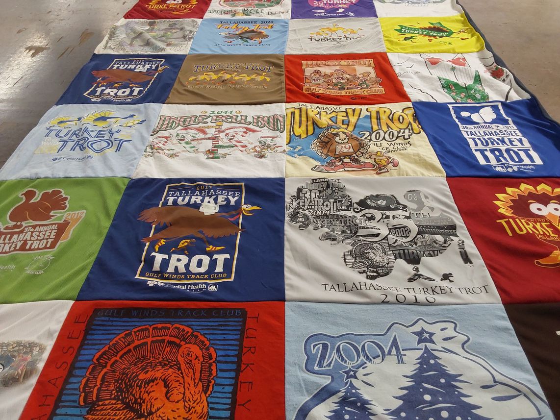 T-shirt quilt with running, fitness themes by Sharyn from TN