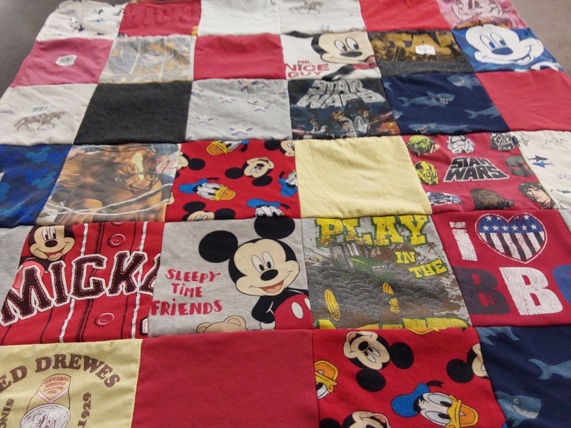 T-shirt quilt with disney, star wars themes by Christa from CA