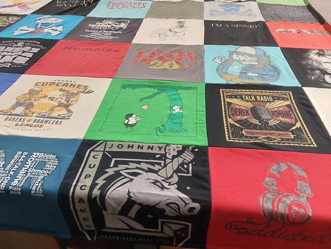 T-shirt quilt with baking, music themes by Romaine from TX
