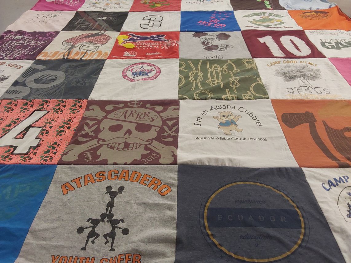 T-shirt quilt with camping, youth activities themes by Dawn from SC