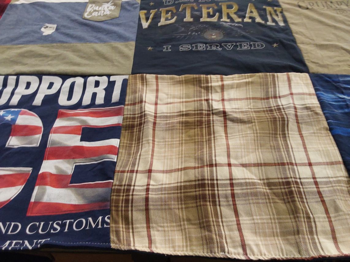 T-shirt quilt with military, patriotism themes by Carolyn from IL