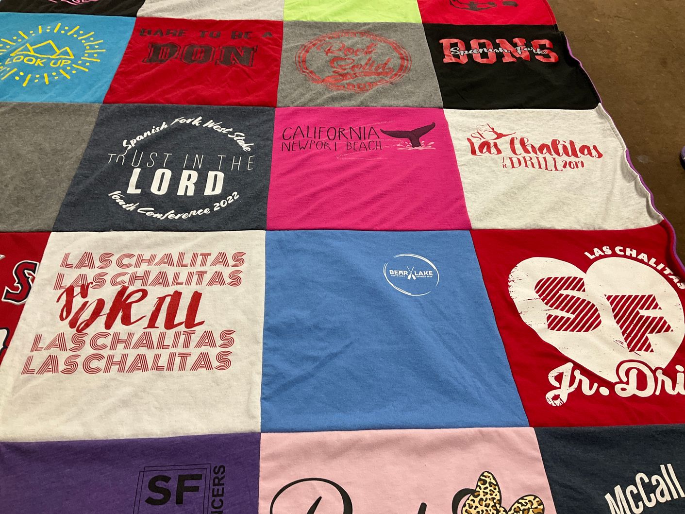 T-shirt quilt with youth conference, community events themes by Sara from UT