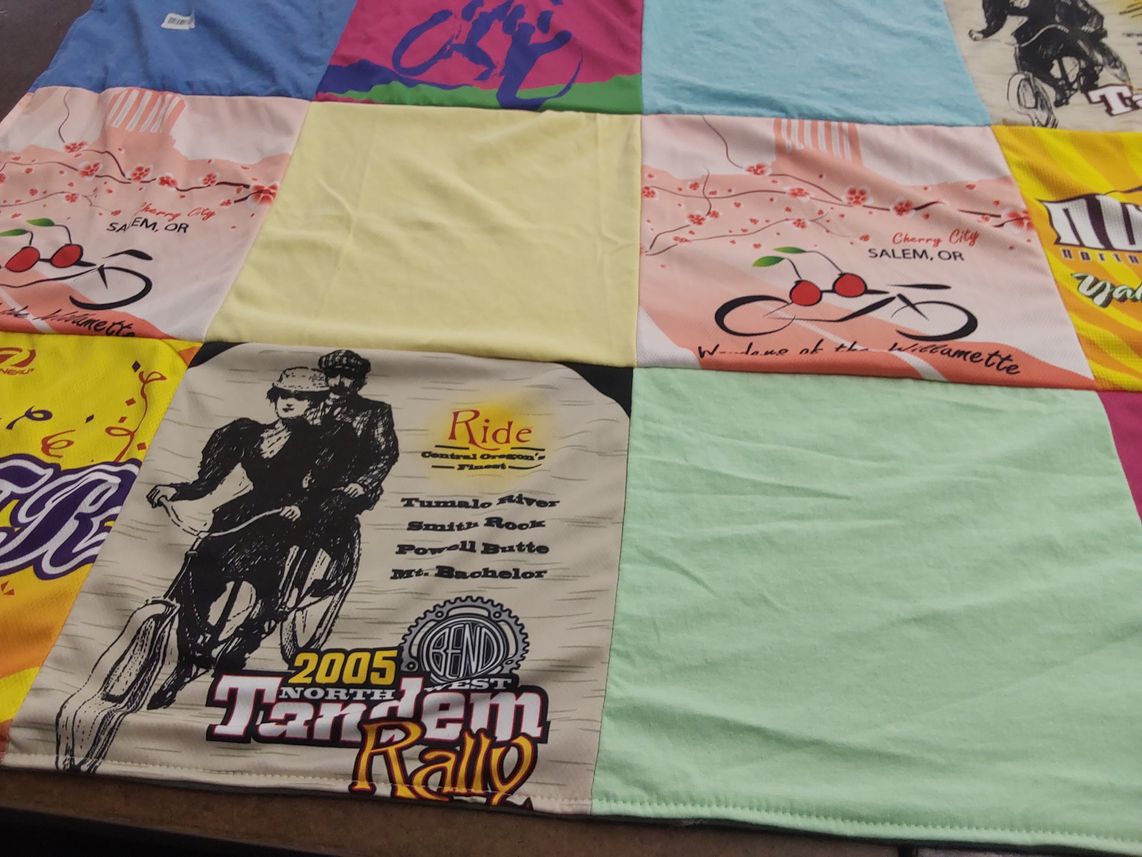 T-shirt quilt with cycling, outdoor activities themes by Charlene from NM