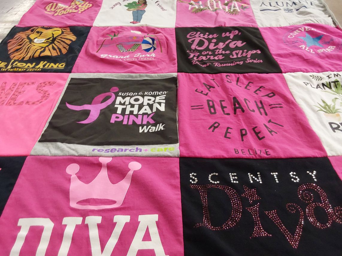 T-shirt quilt with running, travel themes by Jennifer from GA