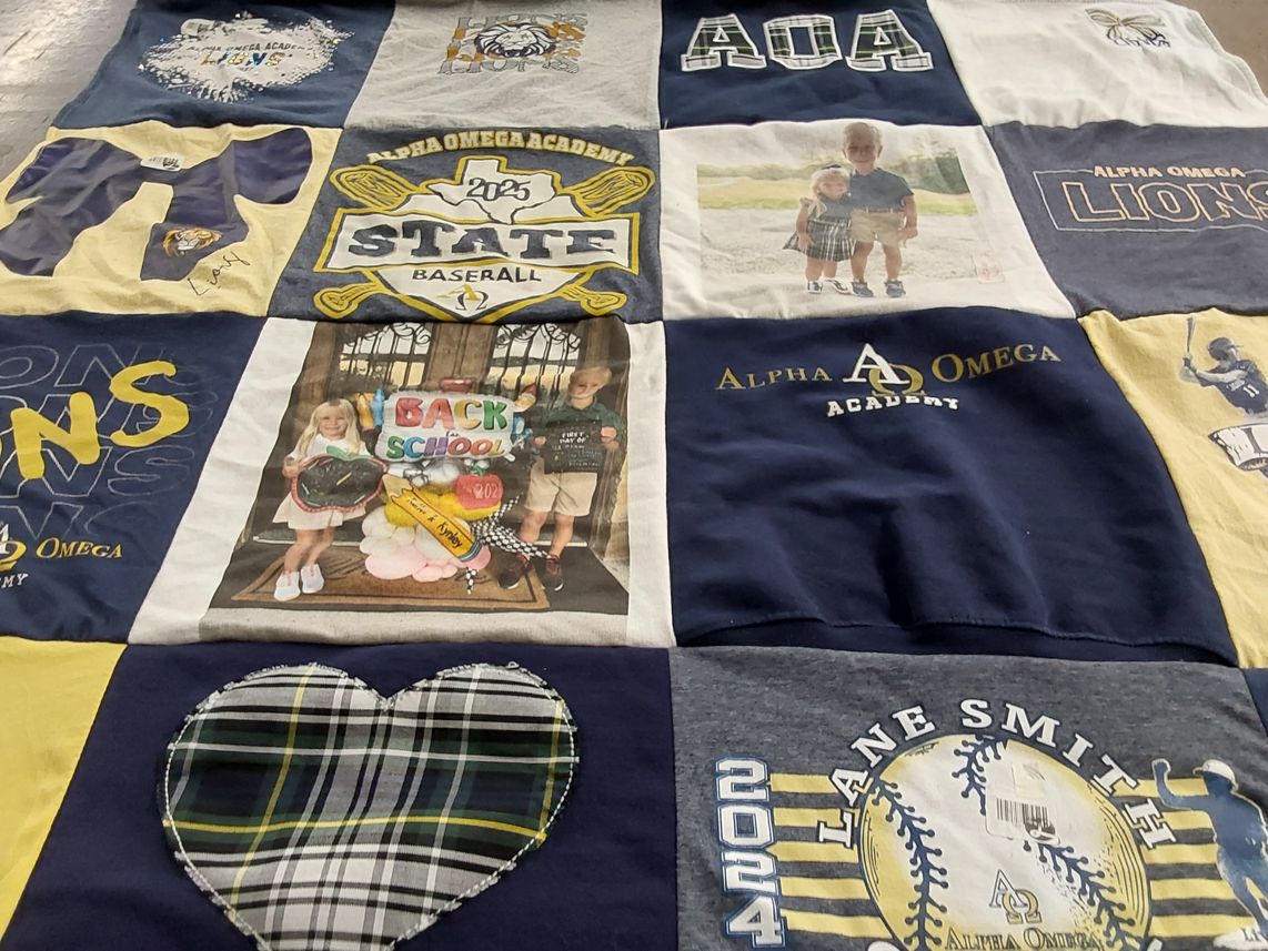 T-shirt quilt featuring alpha omega lions by Tracey from TX