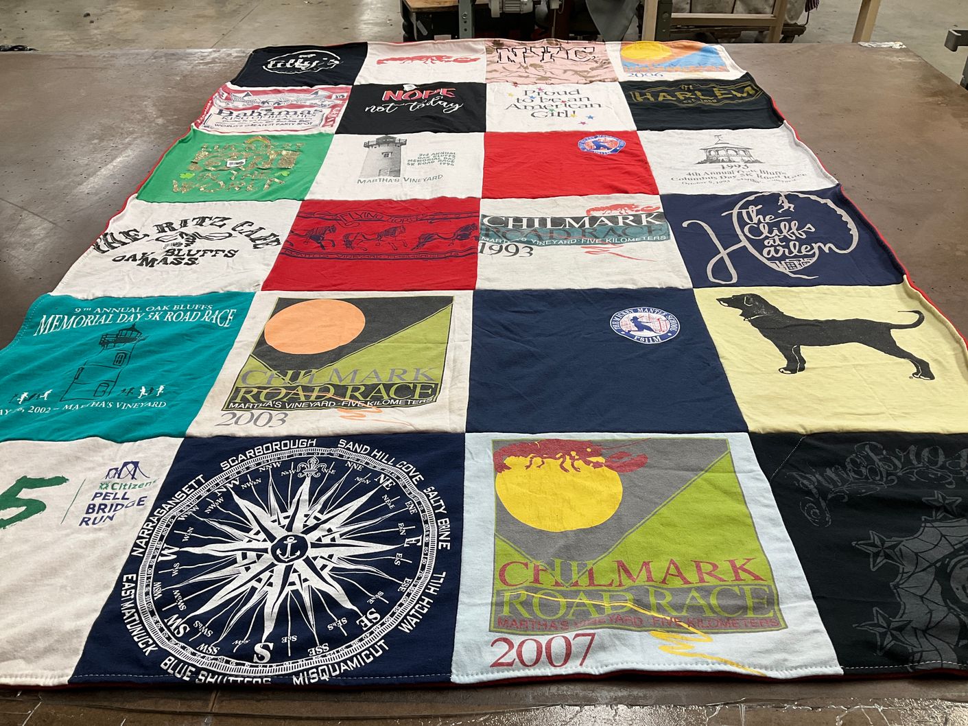 T-shirt quilt with road races, community events themes by Eileen from MA