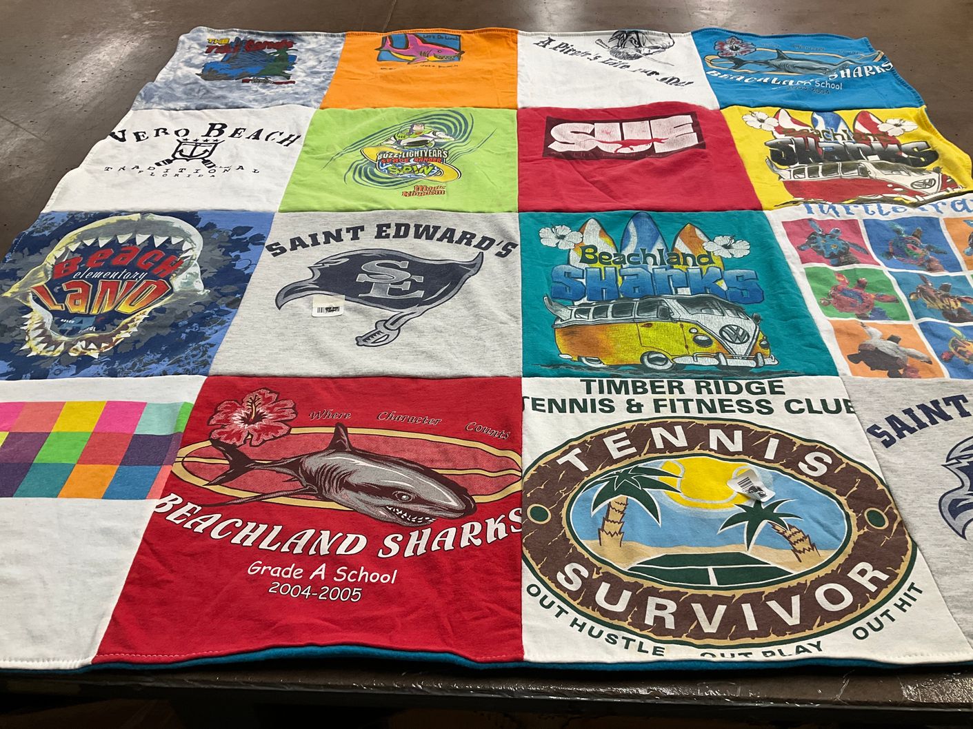 T-shirt quilt featuring beachland sharks, saint edward's sharks by Catherine from NY