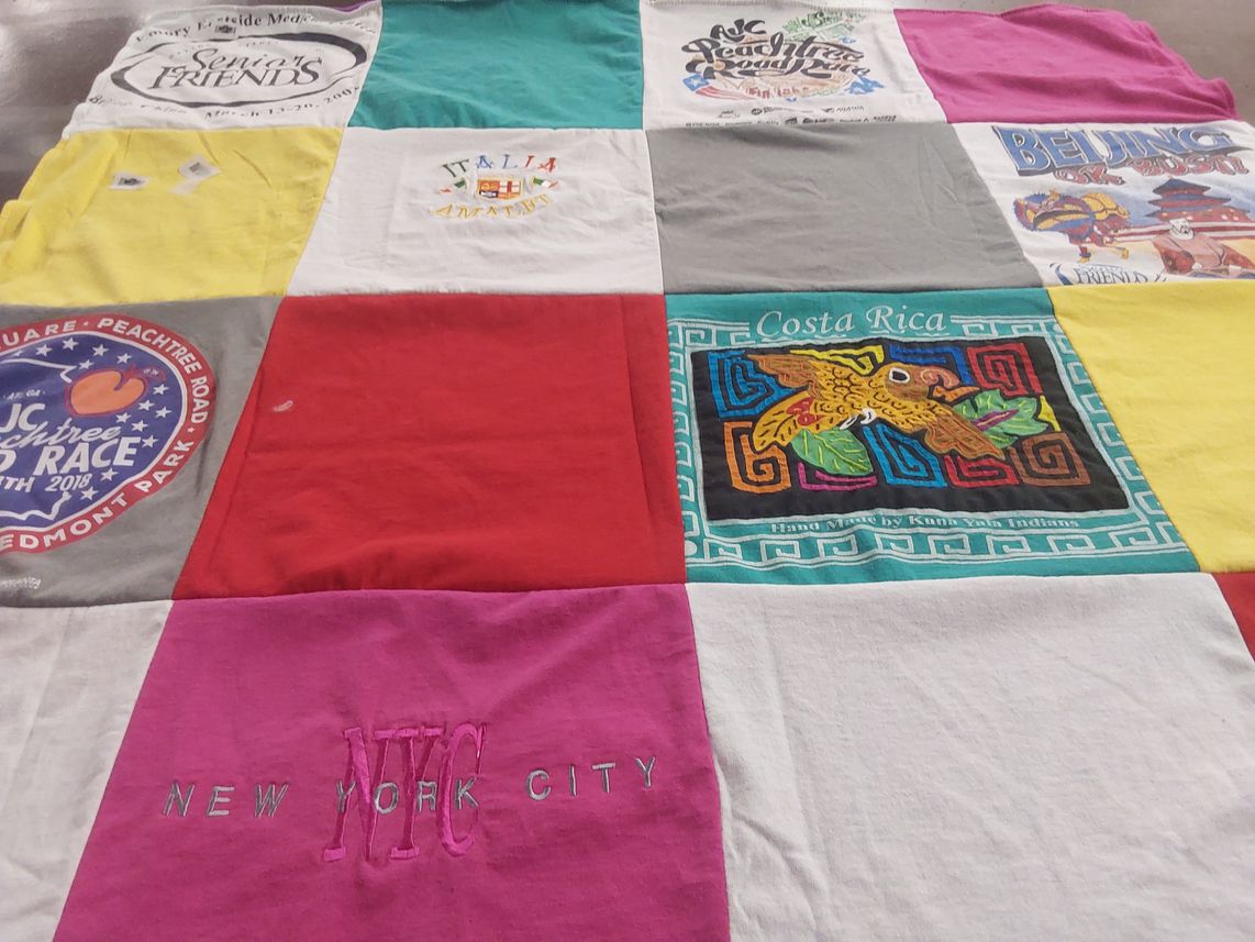 T-shirt quilt with travel, culture themes by Deborah from GA