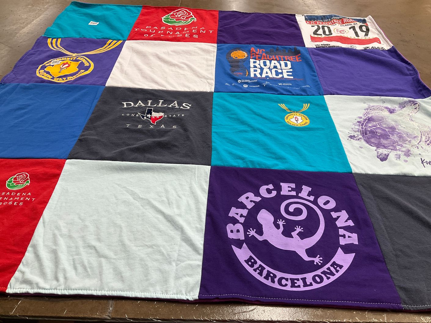 T-shirt quilt with running, events themes by Deborah from GA