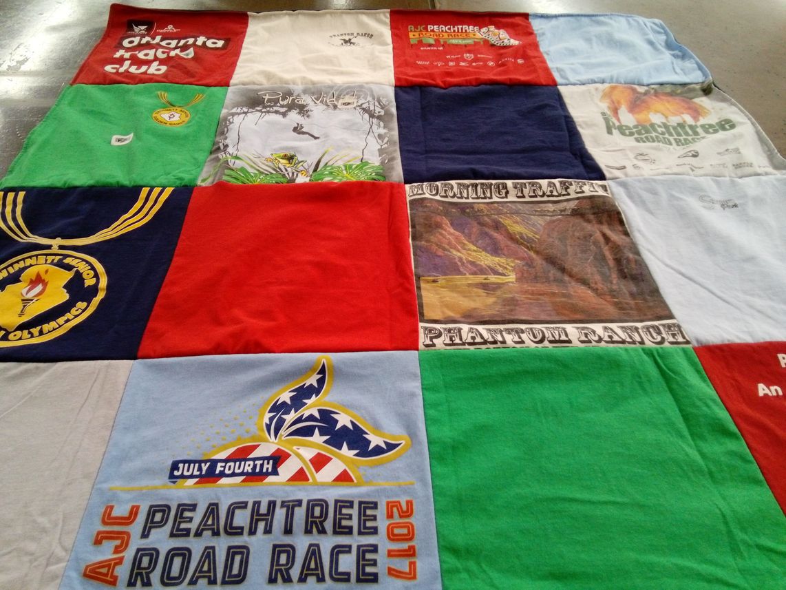 T-shirt quilt with running, athletics themes by Deborah from GA