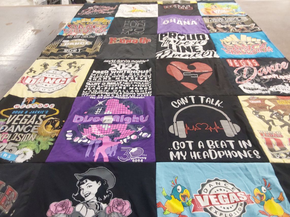 T-shirt quilt with dance, music themes by Mylene from CA