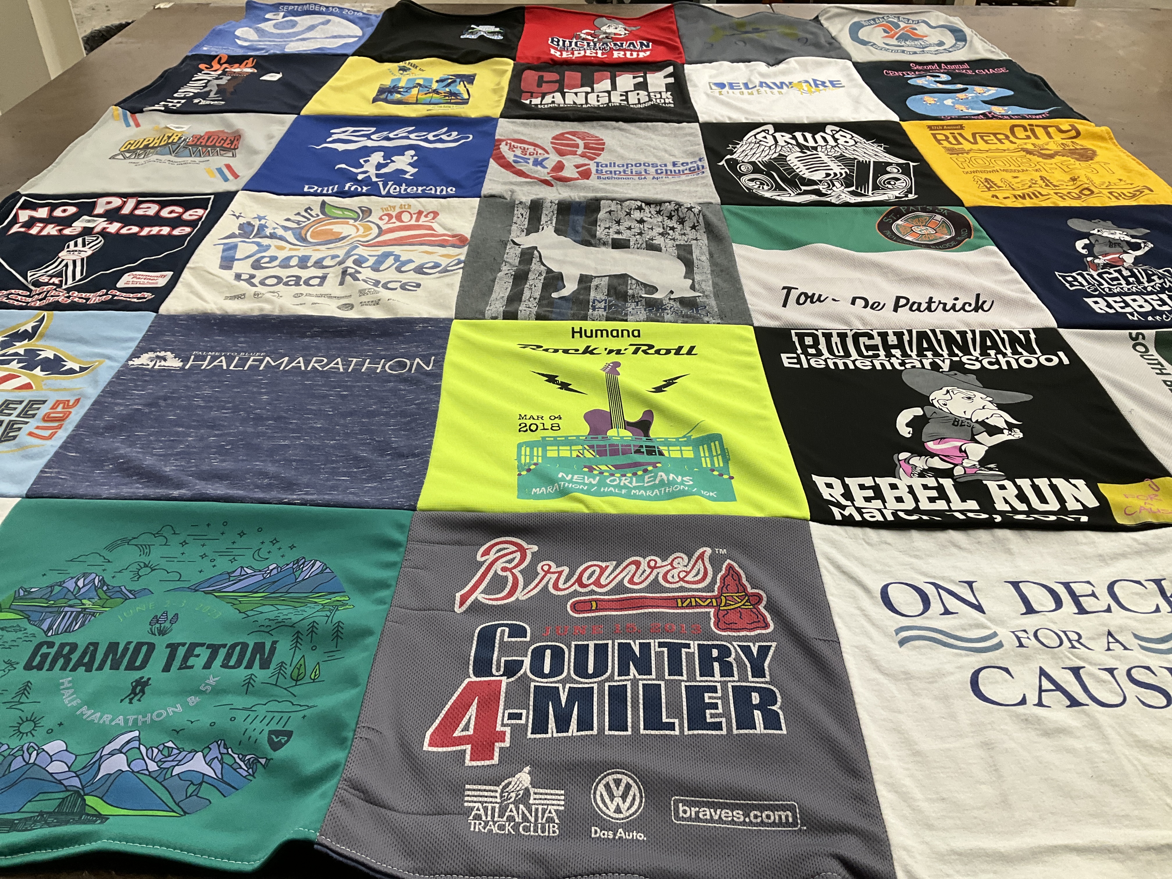 T-shirt quilt with running, charity themes by Vickie from GA