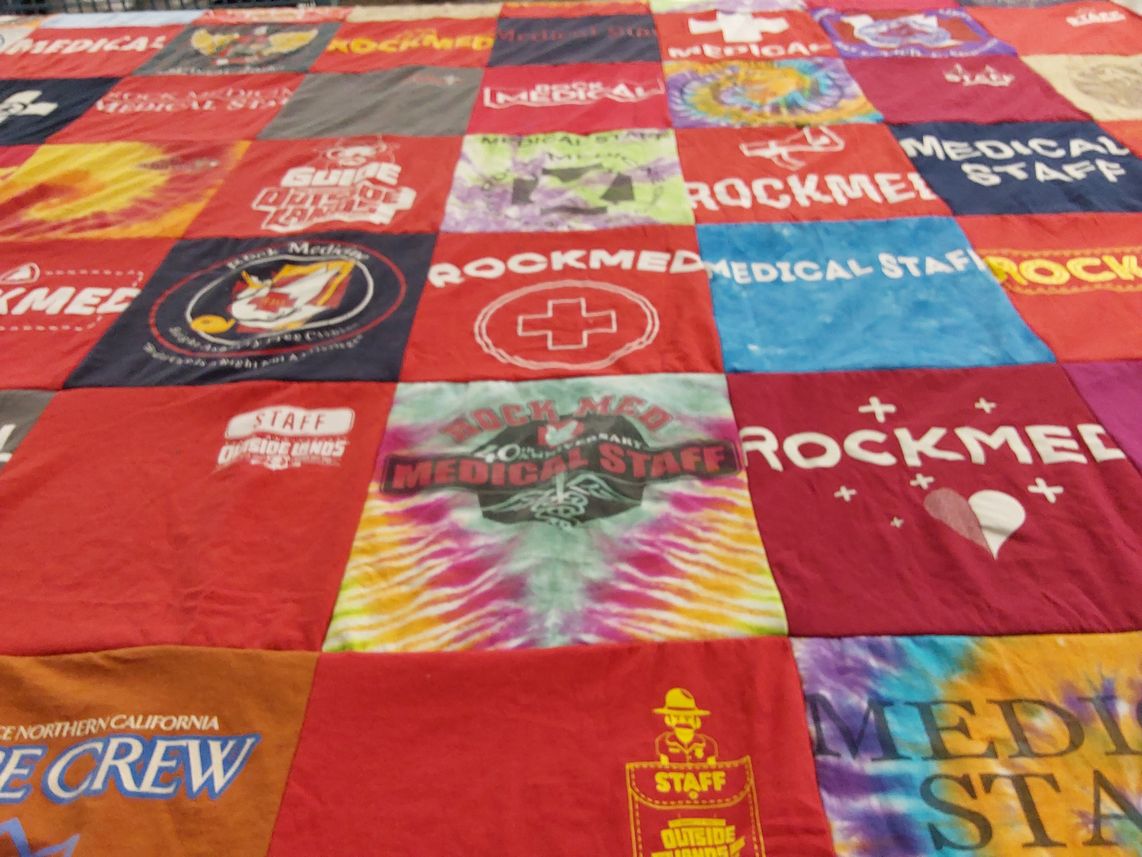 T-shirt quilt with medical, emergency services themes by Audrey from CA