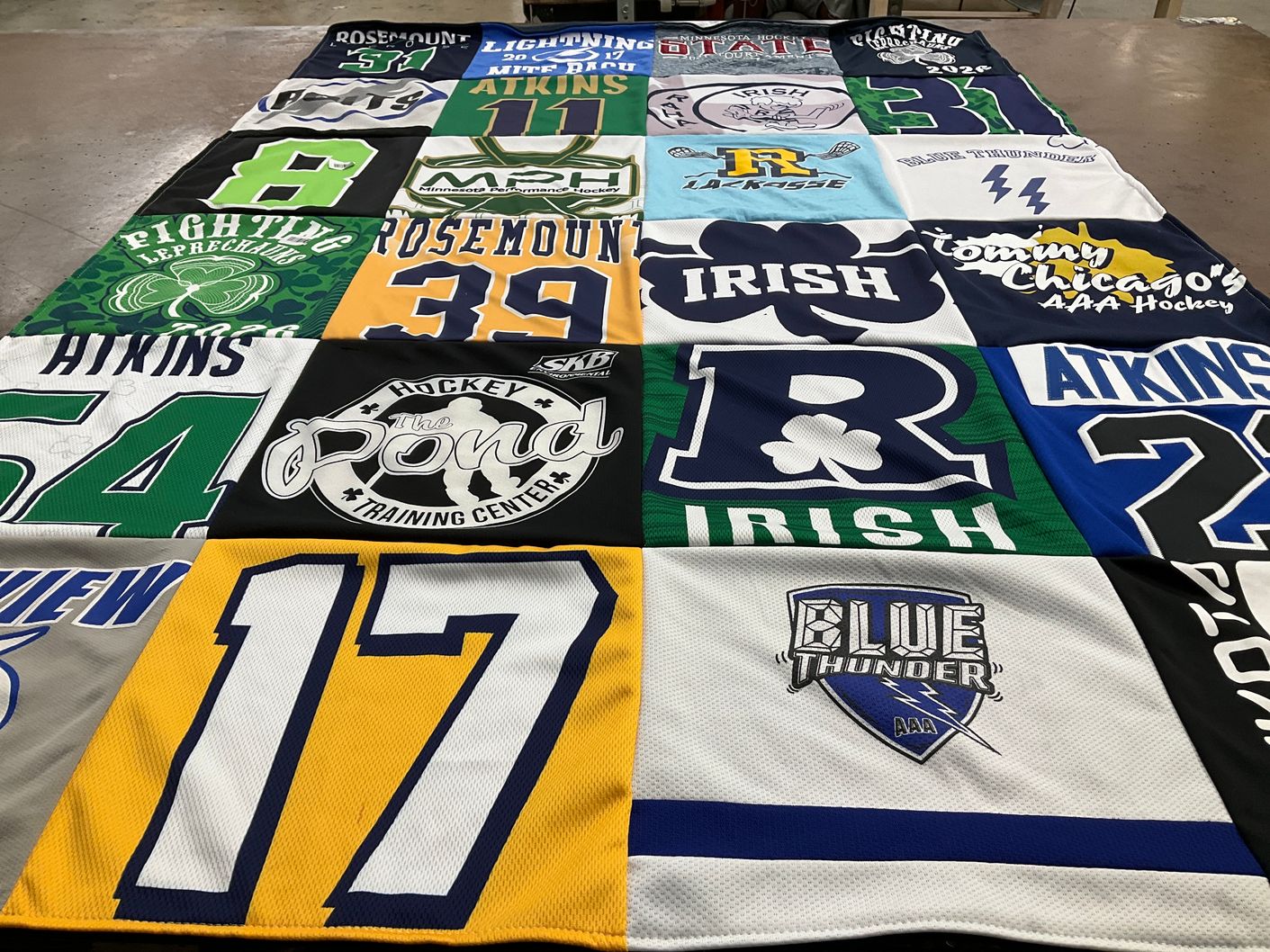 T-shirt quilt featuring blue thunder hockey, fighting irish lacrosse by Jamie from MN