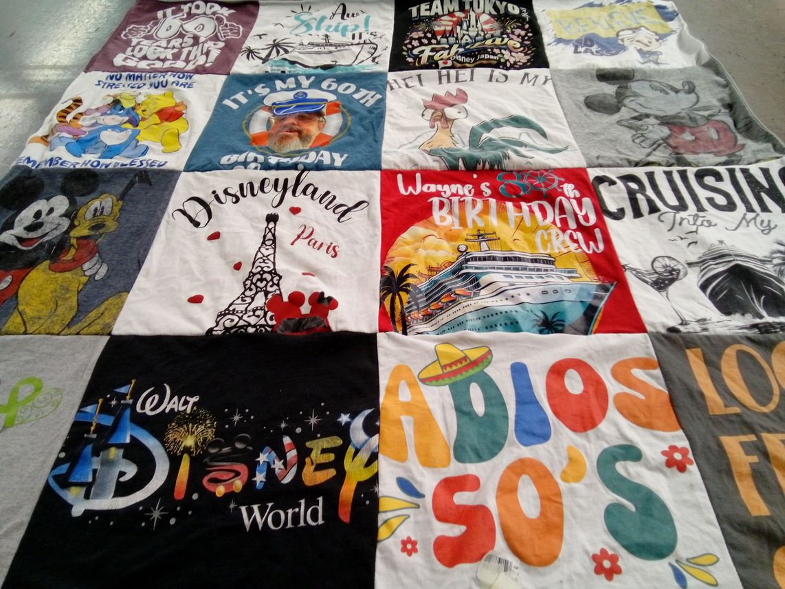 T-shirt quilt with travel, birthdays themes by Michael from IN