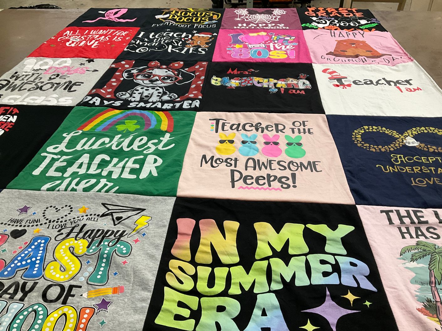 T-shirt quilt with teaching, education themes by Mary K from NJ