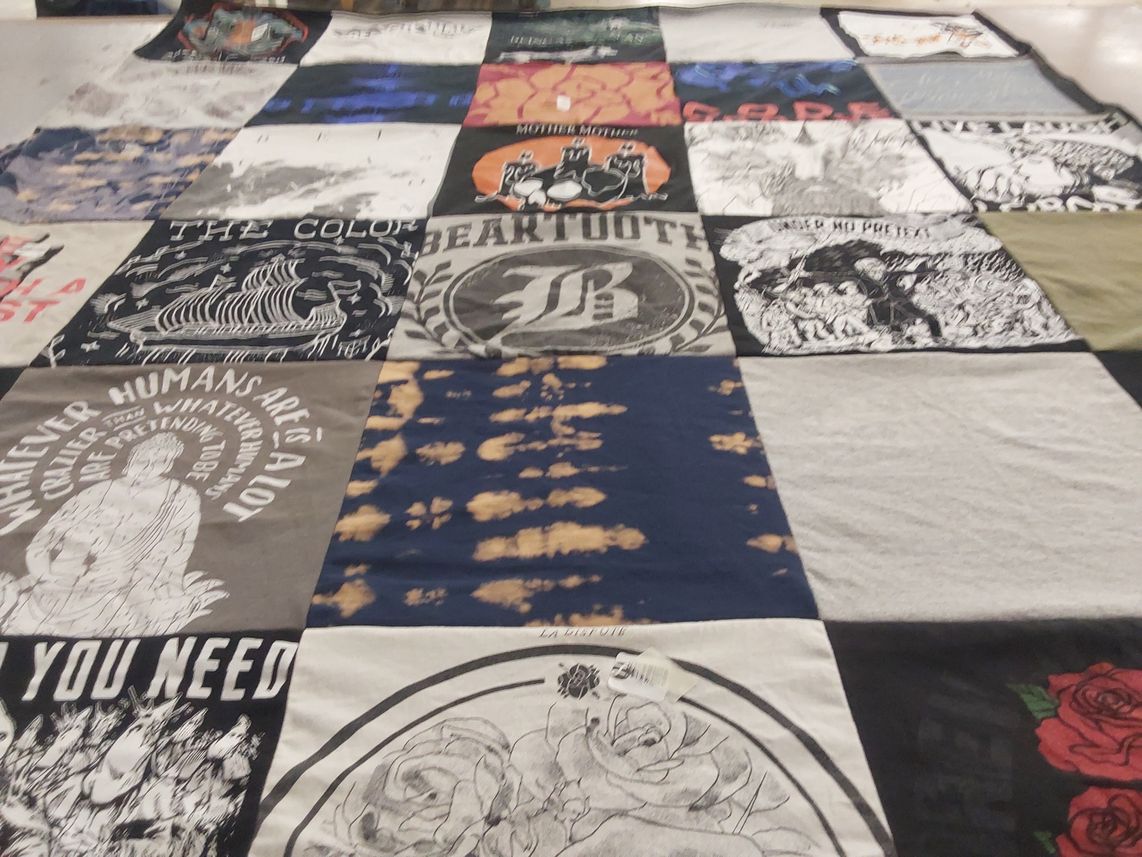 T-shirt quilt with art, sailing themes by Riley from MI