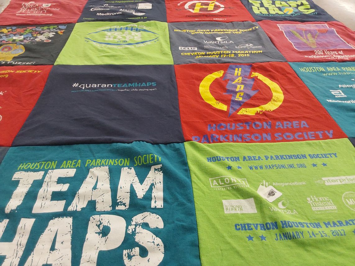 T-shirt quilt with health, community support themes by cindy from TX