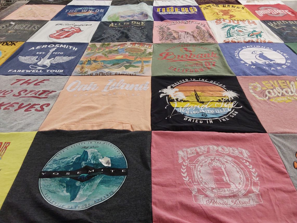 T-shirt quilt with music, travel themes by Aymee from OH