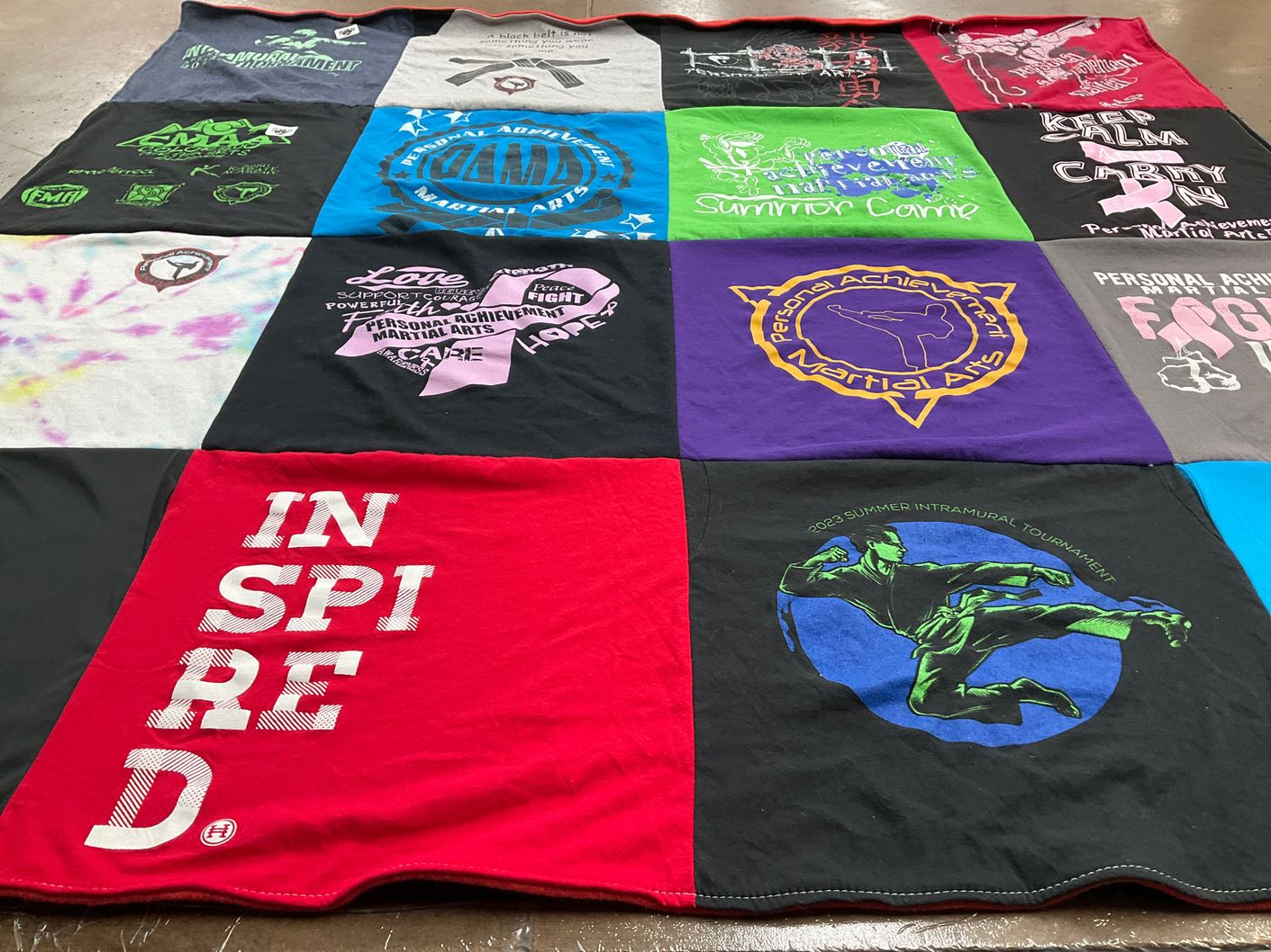 T-shirt quilt with martial arts, self defense themes by Candace from VA