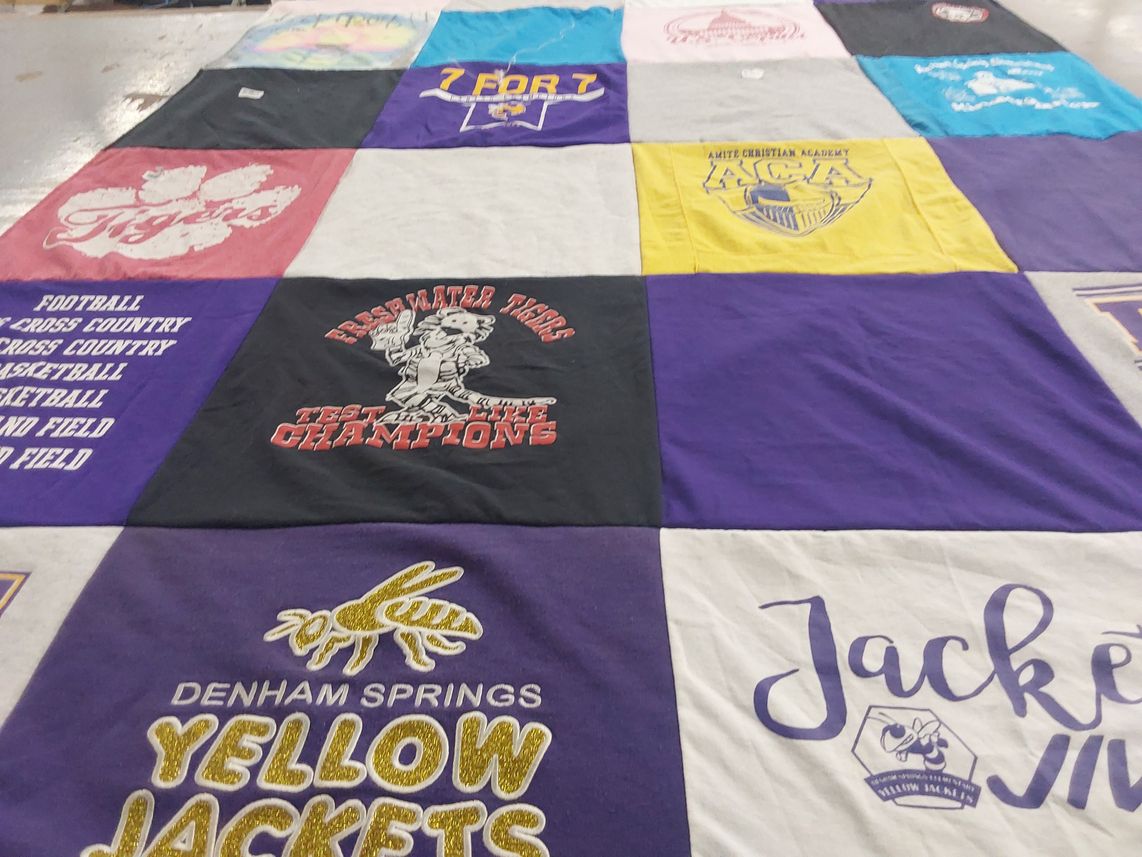 T-shirt quilt featuring denham springs yellow jackets, freshwater tigers by Dana from LA