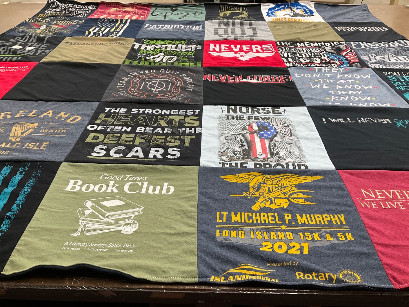 T-shirt quilt with reading, running themes by Kaitlin from TX