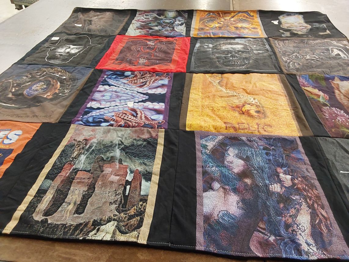 T-shirt quilt with art, fantasy themes by Susan from NY