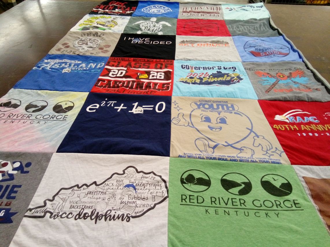 T-shirt quilt featuring wcc dolphins by April from KY