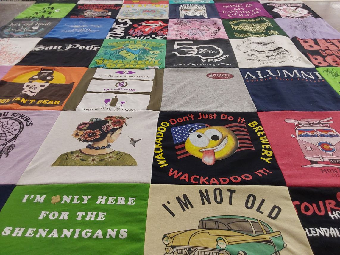 T-shirt quilt with alumni activities, local breweries themes by Rachel from CO