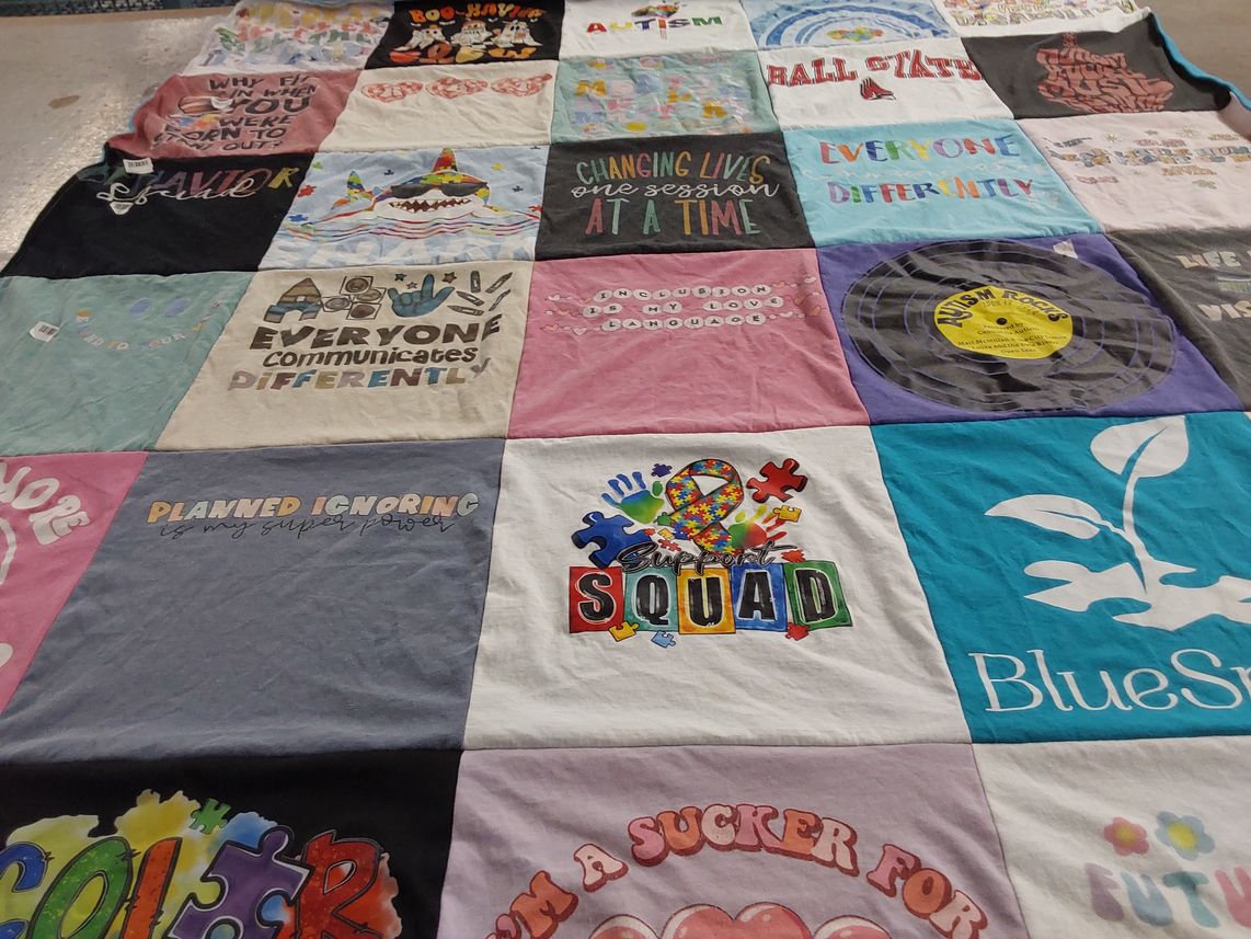 T-shirt quilt with autism awareness, support for autism themes by Ginger from GA