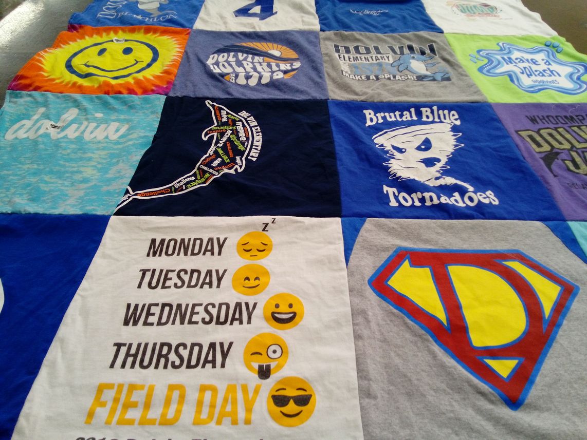 T-shirt quilt featuring brutal blue tornadoes by Sandra from GA