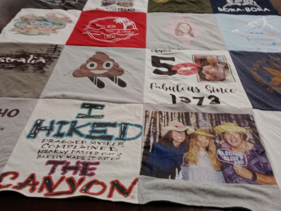 T-shirt quilt with hiking, traveling themes by Ginger from CO