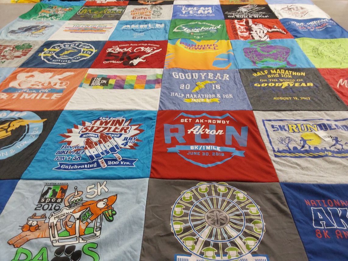 T-shirt quilt with running, sports themes by Katharine from OH