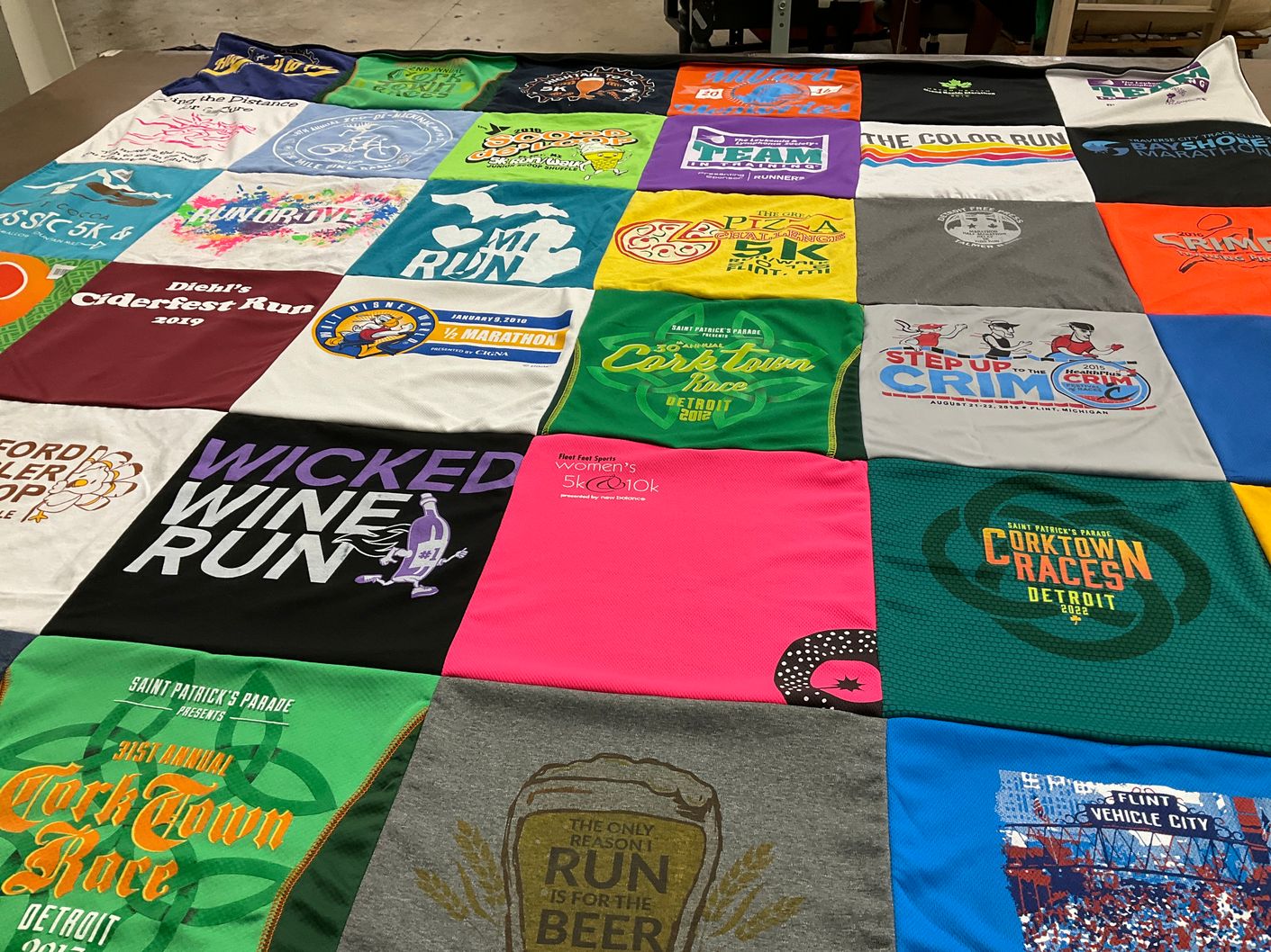 T-shirt quilt with running, sports themes by Marie from MI