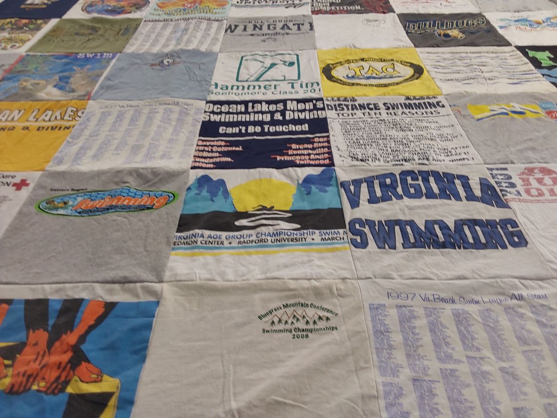 T-shirt quilt featuring ocean lakes swim team by Nancy from VA
