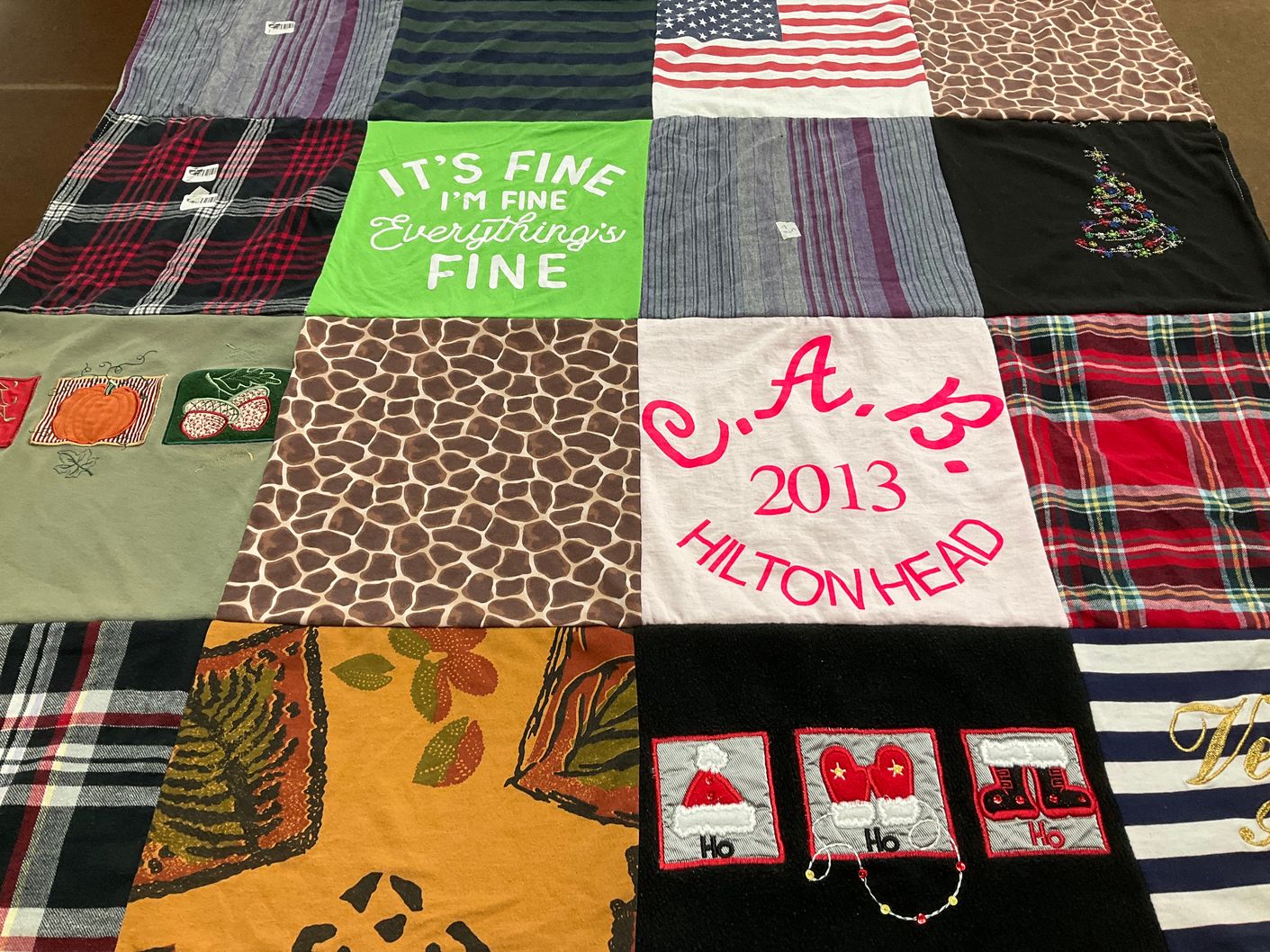 T-shirt quilt with crafting, knitting themes by Jennifer from MD