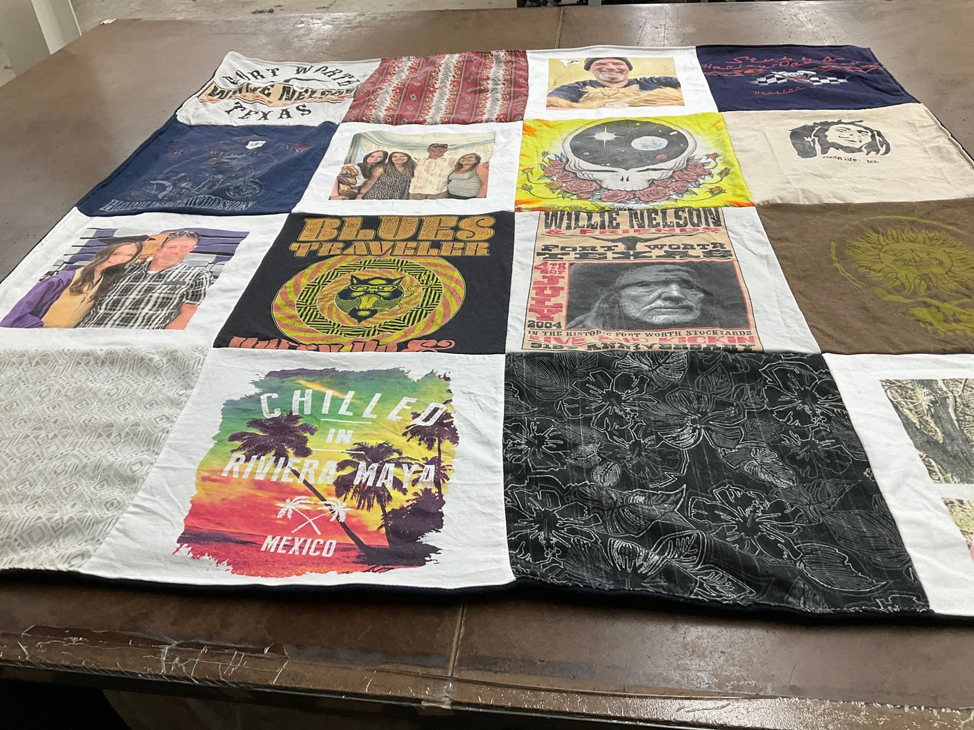 T-shirt quilt with music, travel themes by Heather from IA