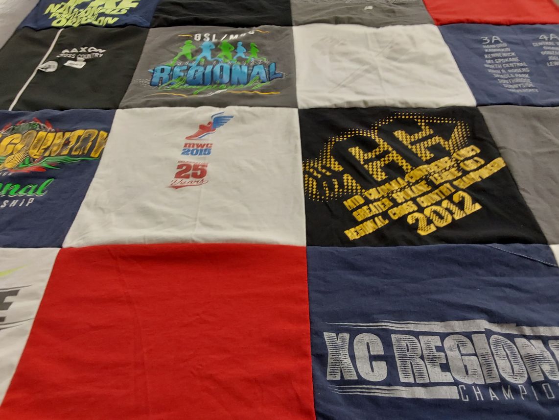 T-shirt quilt with sports, running themes by Kaitlyn from WA