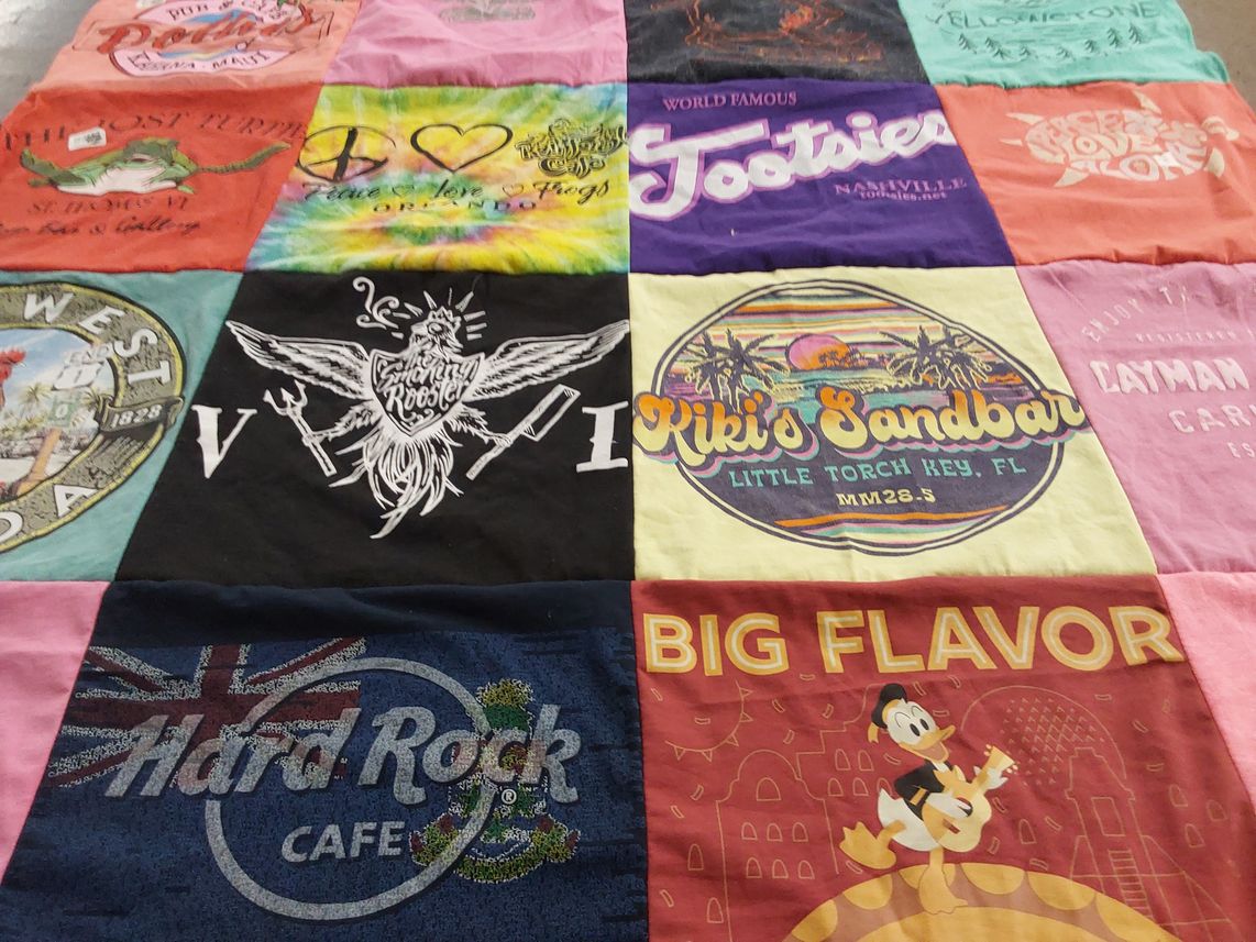 T-shirt quilt with music, entertainment themes by Helen from PA
