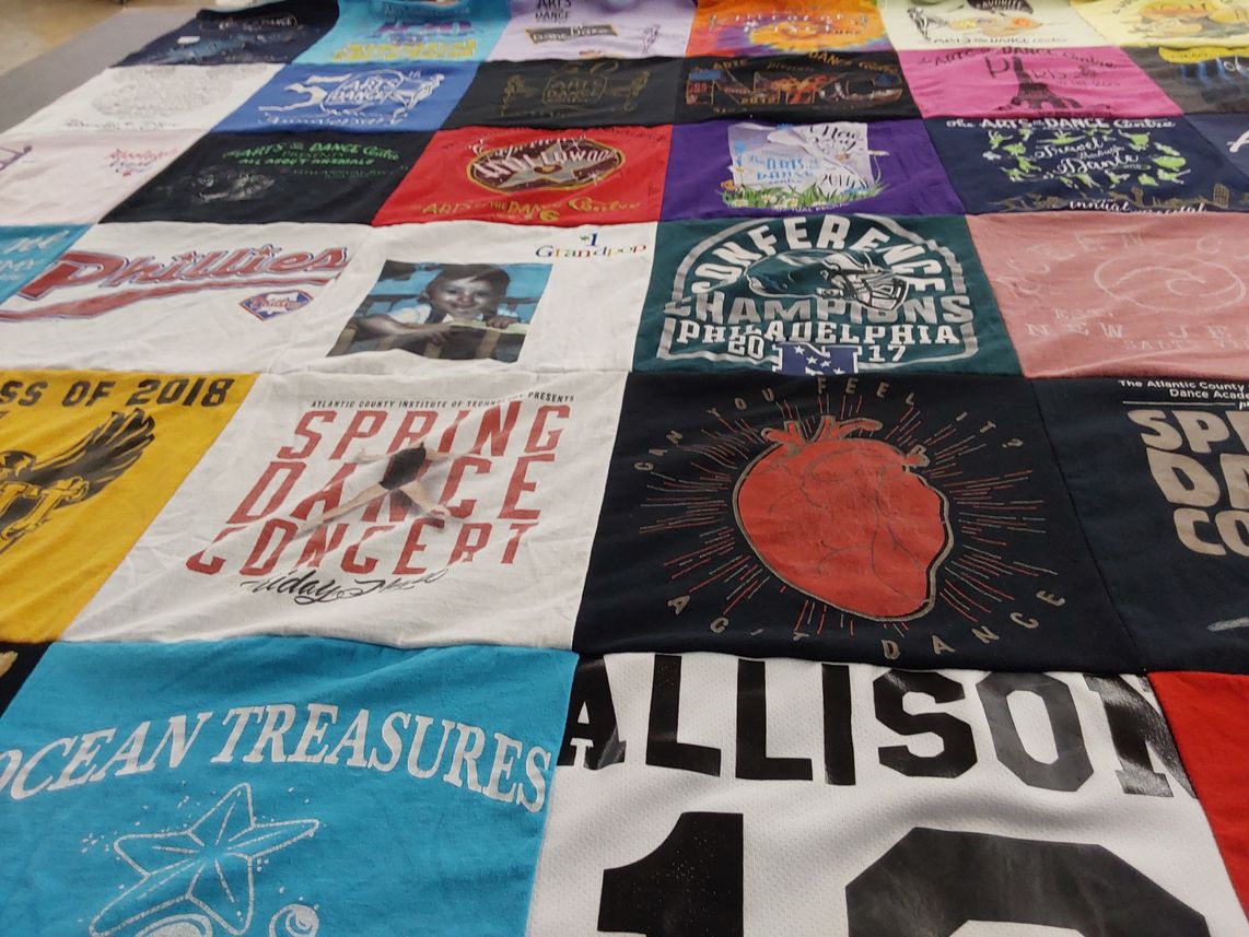 T-shirt quilt with dance, concerts themes by Diane from NJ