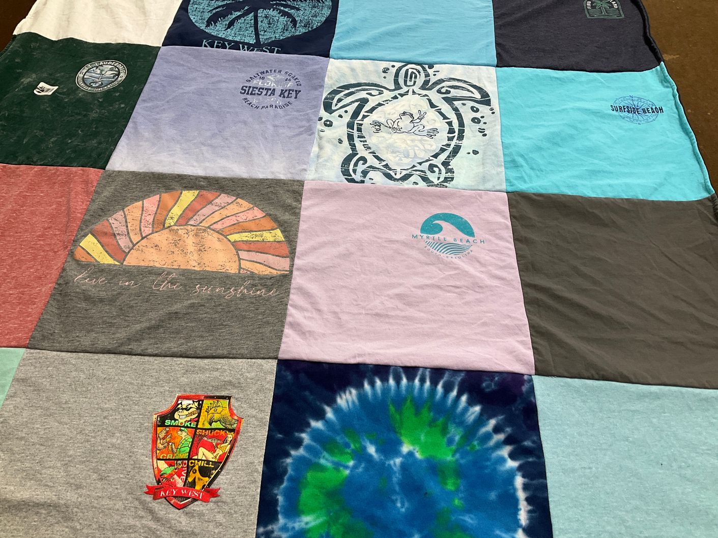 T-shirt quilt with beach, sunshine themes by April from OH