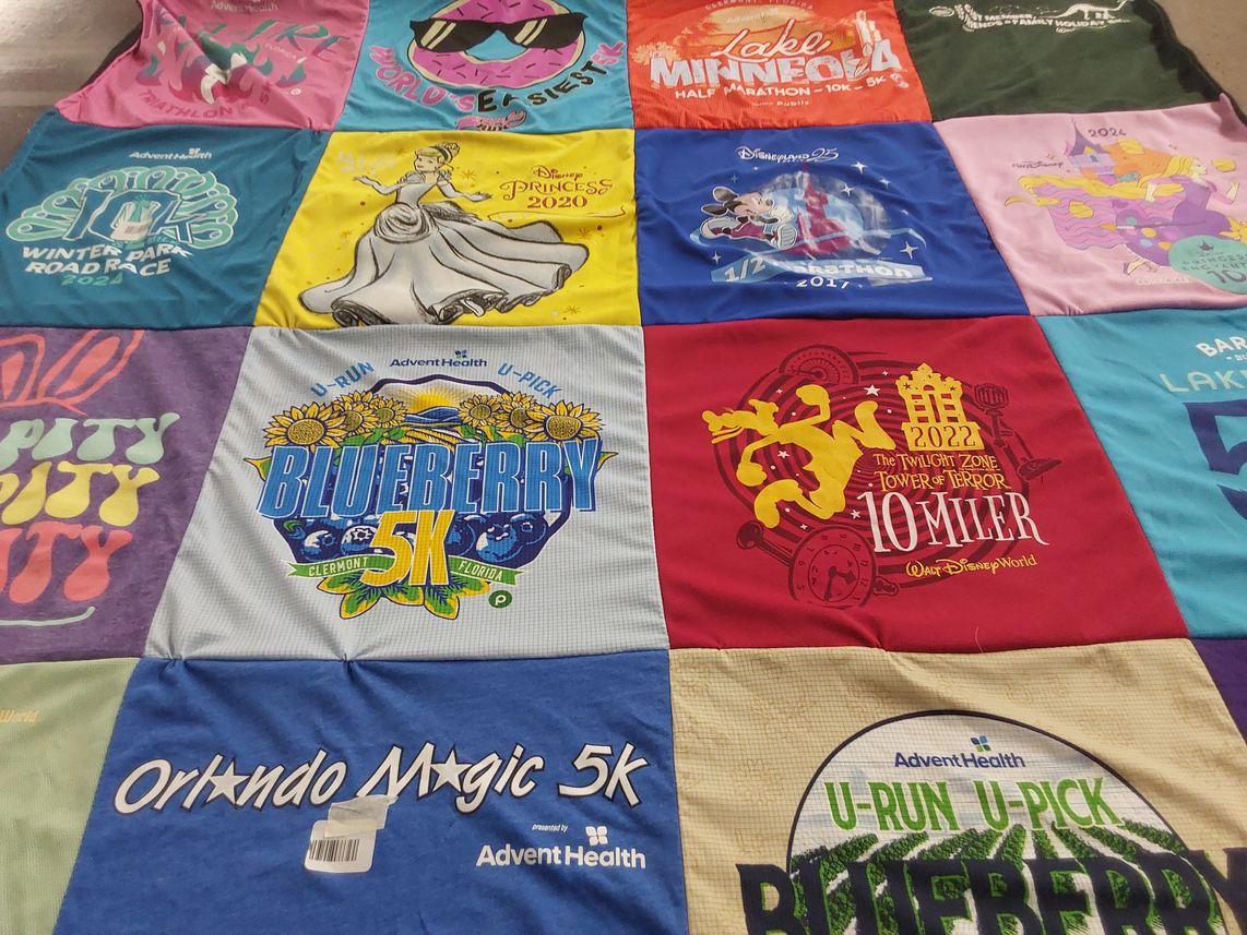 T-shirt quilt with running, disney themes by Meredith from FL