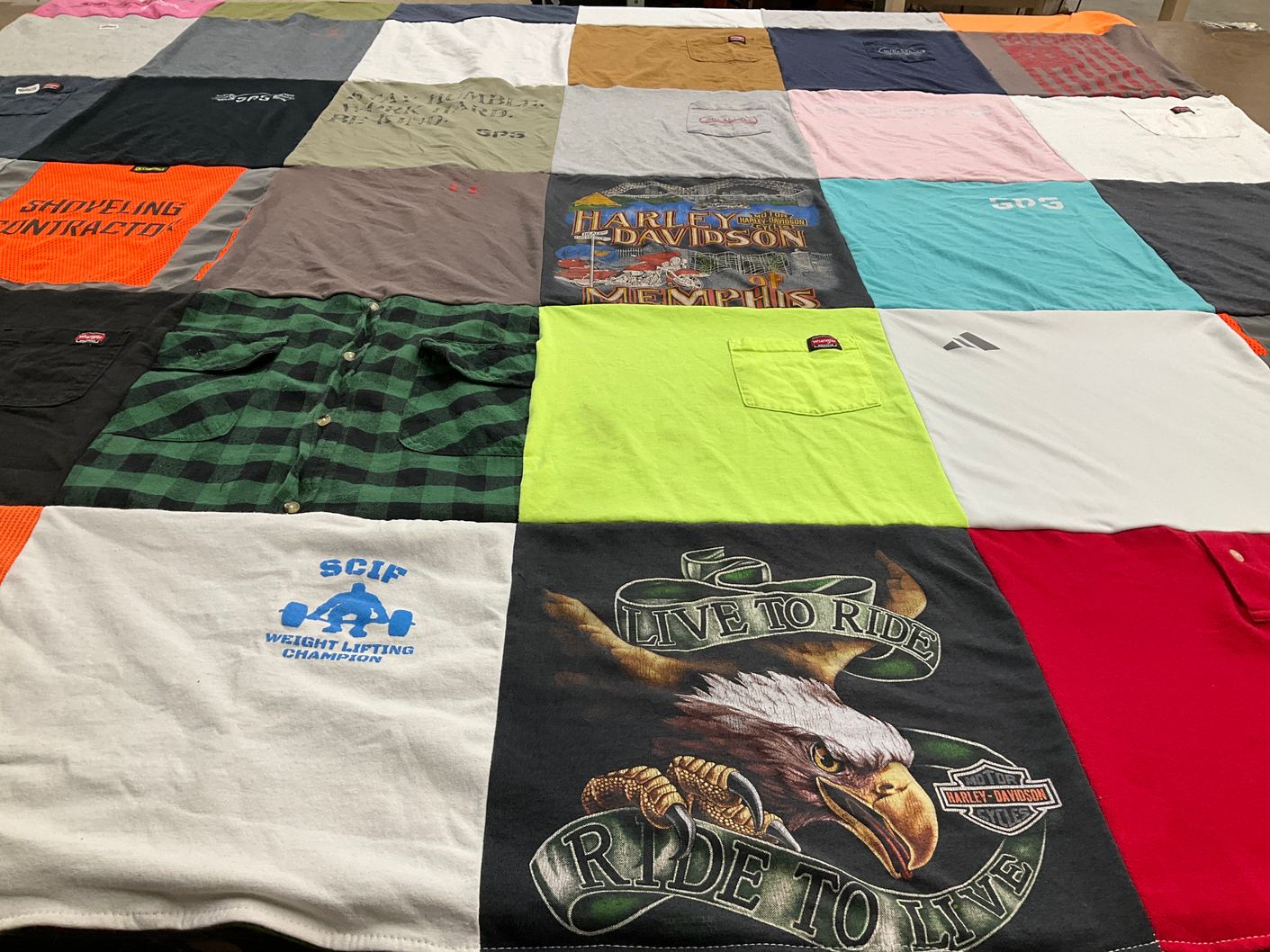 T-shirt quilt with motorcycles, weight lifting themes by Samantha from PA