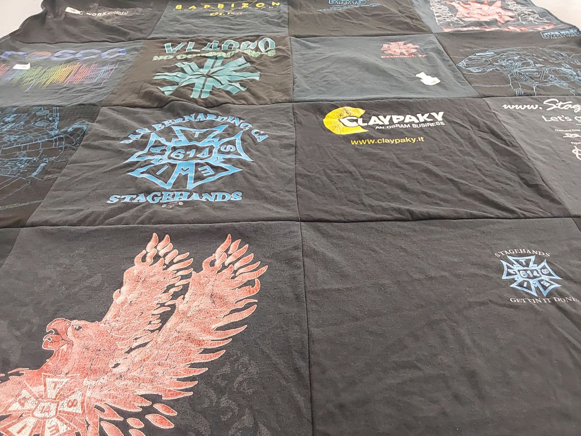 T-shirt quilt with theater, lighting themes by Elisabeth from NC