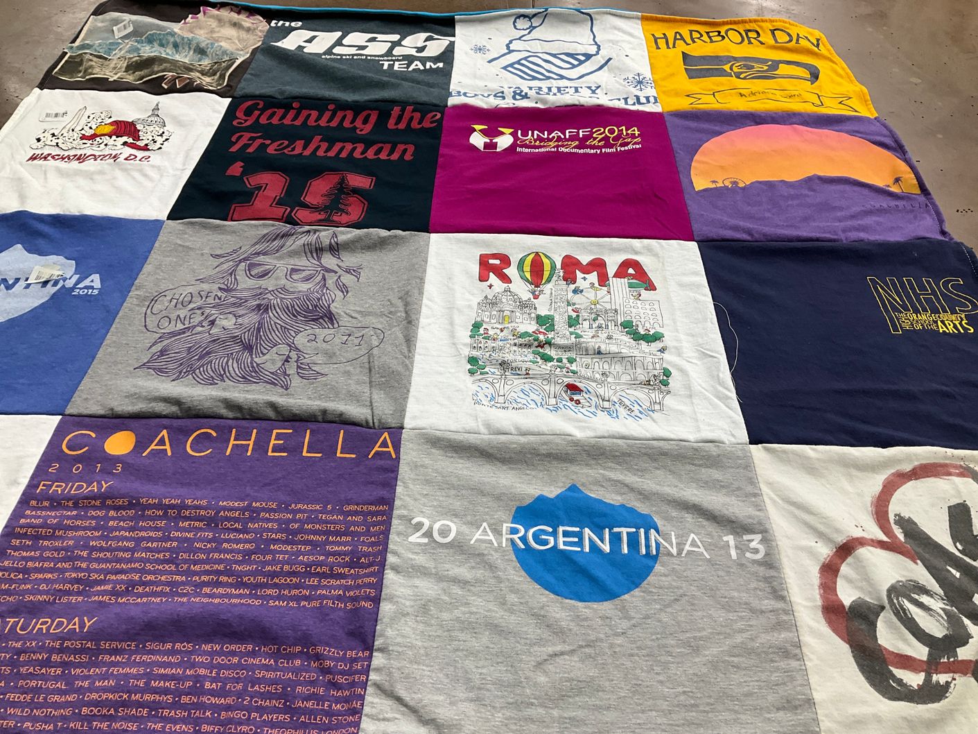 T-shirt quilt with music festivals, travel themes by Dr. Robert from CA